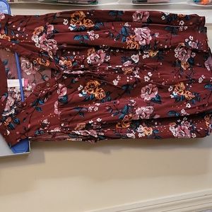 Burgundy floral shirt.